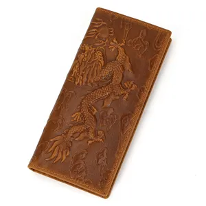 Detailed view of the embossed dragon pattern on the brown vintage genuine leather long wallet.