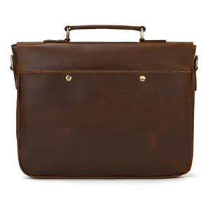 Detail view of the brown crazy horse leather briefcase, showing premium leather texture.
