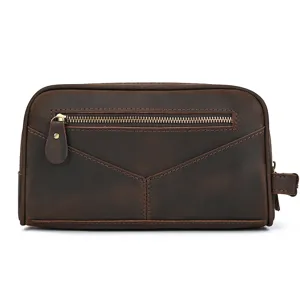 Retro leather toiletry bag detail view, vintage crazy horse cowhide travel makeup pouch.