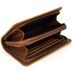 Vintage brown genuine leather long wallet detail view, featuring multi-card slots and dual zippers.
