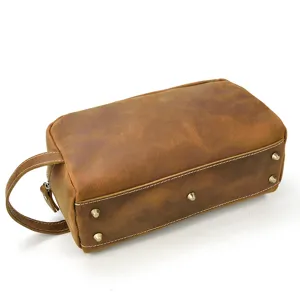 Vintage genuine leather toiletry bag for men, large capacity travel wash storage bag item.