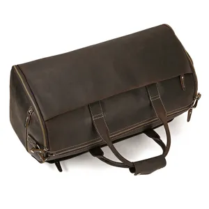 Vintage genuine leather travel duffel bag detail, multifunctional folding gym luggage storage.
