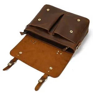 Detailed view of brown crazy horse leather vintage men messenger briefcase with metal snaps.