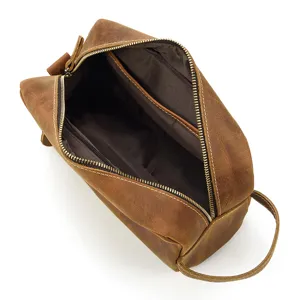 Detailed top view of the genuine leather toiletry bag showcasing its spacious interior and zipper.