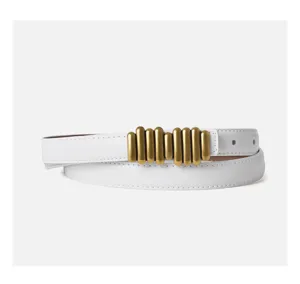 Elegant white leather belt featuring unique gold metal bar buckle for stylish women outfits.