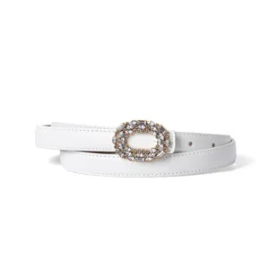 White leather belt for women featuring sparkling rhinestone oval buckle, chic jeans waist accessory.