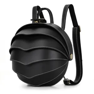 Black leather backpack with a unique beetle shell layered design, stylish and creative.