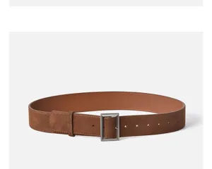 Brown suede belt detail showing retro square metal buckle and soft texture for women.