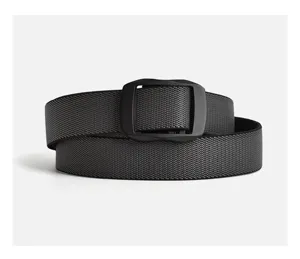 Close-up detail of black tactical nylon belt with smooth buckle, durable and sleek design.