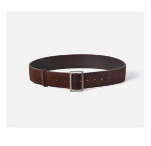 Brown suede women belt detail showing premium texture and metallic rectangular buckle.