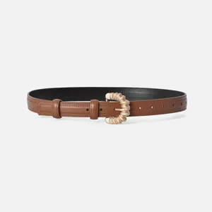 Brown leather belt with gold twisted buckle, stylish accessory for jeans, sweaters, and casual pants.
