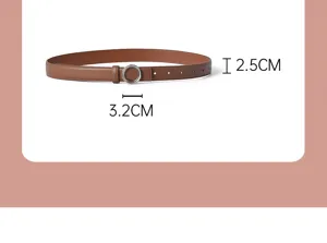 Vista detallada de cinturón de cuero genuino marrón para mujer con hebilla redonda de metal.
