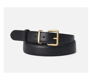 Black leather belt detail showing the classic gold metal pin buckle and neat stitching.
