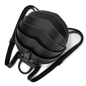 Unique black leather backpack featuring creative beetle shell design and contrast stitching.