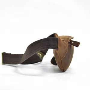 Vintage genuine leather waist bag detailed view showing durable canvas strap and side profile.