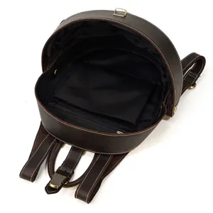 Leather beetle backpack interior detail view, brown vintage style casual school daypack.