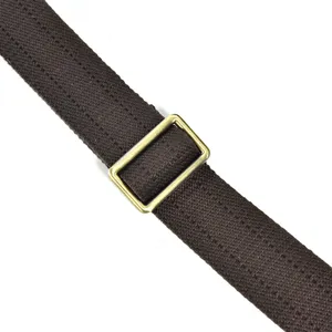 Brown canvas bag strap with adjustable metal buckle, durable replacement strap for bags.