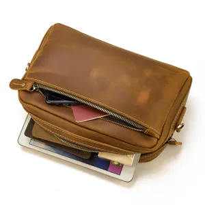 Sac bandoulière en cuir vintage pour homme, grande capacité, pochette multifonctionnelle.