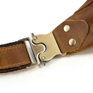 Leather bag detail view showcasing durable metal quick-release buckle, crazy horse leather.