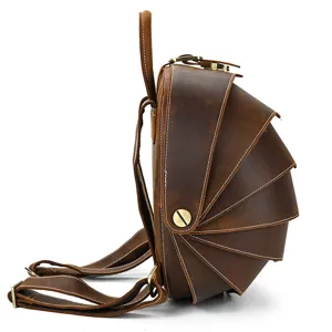 Creative leather backpack, vintage brown armadillo shell design, stylish men's daypack.