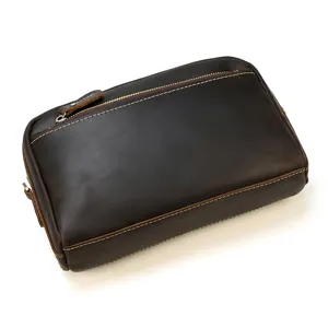 Sac clutch marron vintage en cuir veritable pour hommes, grand sac bandouliere multifonction.