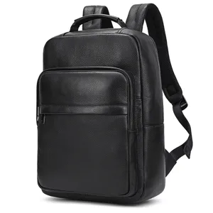Premium black leather business backpack detail view showcasing durable pebbled texture.