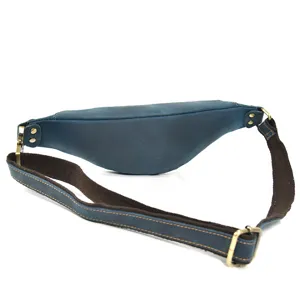 Details of the vintage genuine leather waist bag back, showing durable bronze metal hardware.