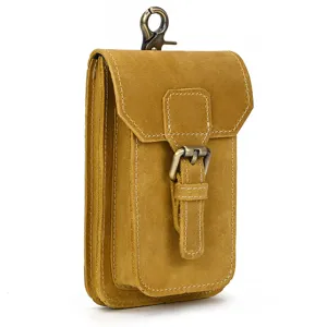 Genuine leather waist bag detail shot, vintage metal buckle and durable belt loop design.
