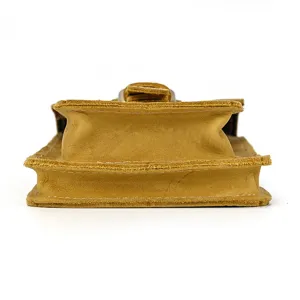 Genuine leather waist bag bottom detail showing sturdy stitching and premium suede texture.