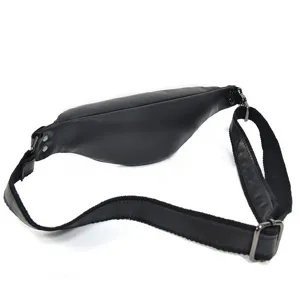 Detail view of black genuine leather waist bag strap buckle, versatile mens chest bag style.
