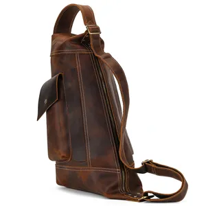 Detail view of the vintage genuine leather chest bag, showing durable cowhide texture and zippers.