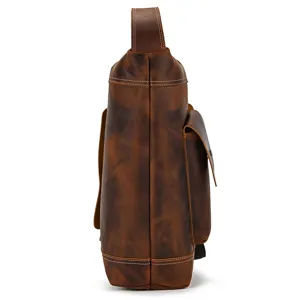 Side view detail of vintage crazy horse leather men chest bag sling backpack travel.