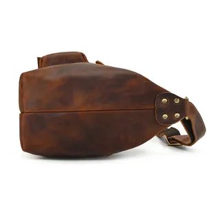 Vintage crazy horse leather chest bag, detailed side view showing premium cowhide and solid hardware.