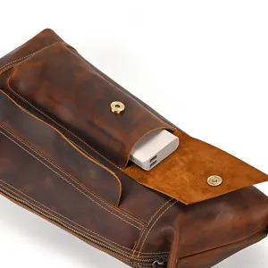 Vintage crazy horse leather chest bag detail, premium cowhide crossbody bag texture.