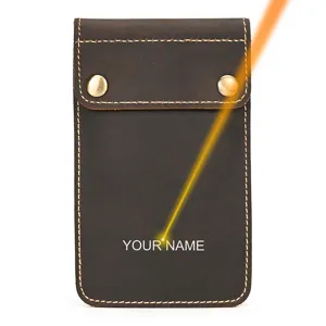 Detail view of retro crazy horse leather watch storage pouch with laser custom engraving.