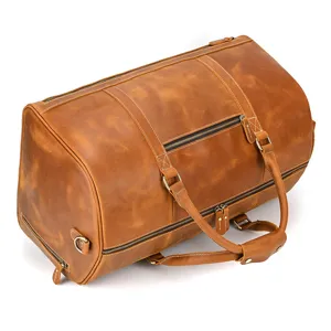 Genuine crazy horse leather vintage travel duffel bag with handles and spacious compartment.