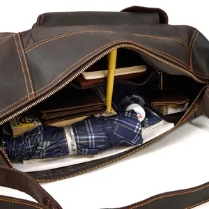 Detailed view showcasing the spacious interior of the vintage leather messenger bag.