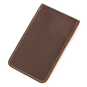 Leather watch pouch detail, vintage brown crazy horse cowhide portable watch storage sleeve.