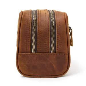 Vintage crazy horse leather toiletry bag with double zippers for men and women storage.