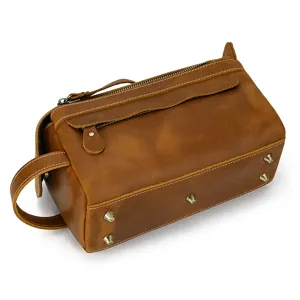 Retro genuine leather toiletry bag for men and women, vintage travel makeup storage clutch.