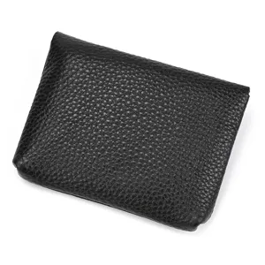Detailed view of the genuine cowhide leather snap coin purse with pebble texture for men and women.