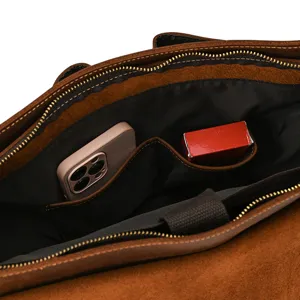 Detail view of vintage genuine leather briefcase interior with multi-compartments for men.