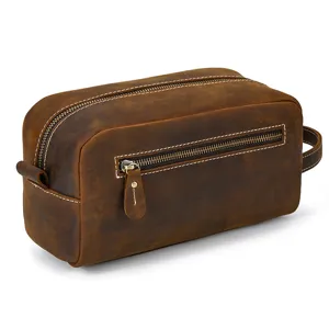 Vintage genuine leather toiletry bag, spacious cosmetic travel pouch detail view.