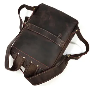 Detailed view of genuine crazy horse leather vintage men backpack with sturdy stitching.