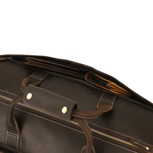 Detailed view of genuine leather travel bag vintage duffel handle stitching hardware quality