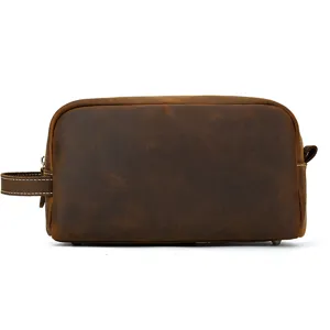 Detailed view of vintage genuine leather toiletry bag, premium texture and durable hardware.