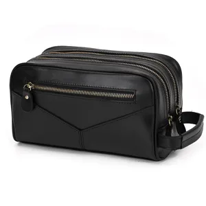 Genuine leather toiletry bag for men and women, double zipper travel wash organizer detail.