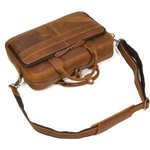 Vintage leather briefcase detail, men's business messenger shoulder bag and laptop bag.