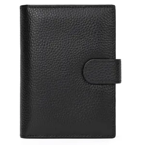 Black genuine leather passport wallet featuring multiple card slots and snap closure detail.