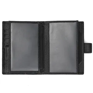 Detailed view of black leather passport wallet showing card slots, transparent ID windows.